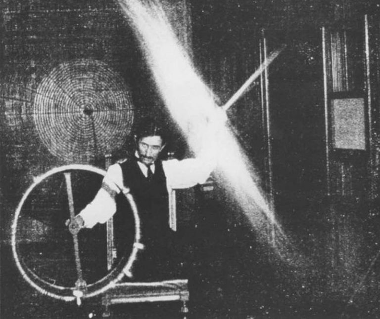 Tesla experimenting with equipment.