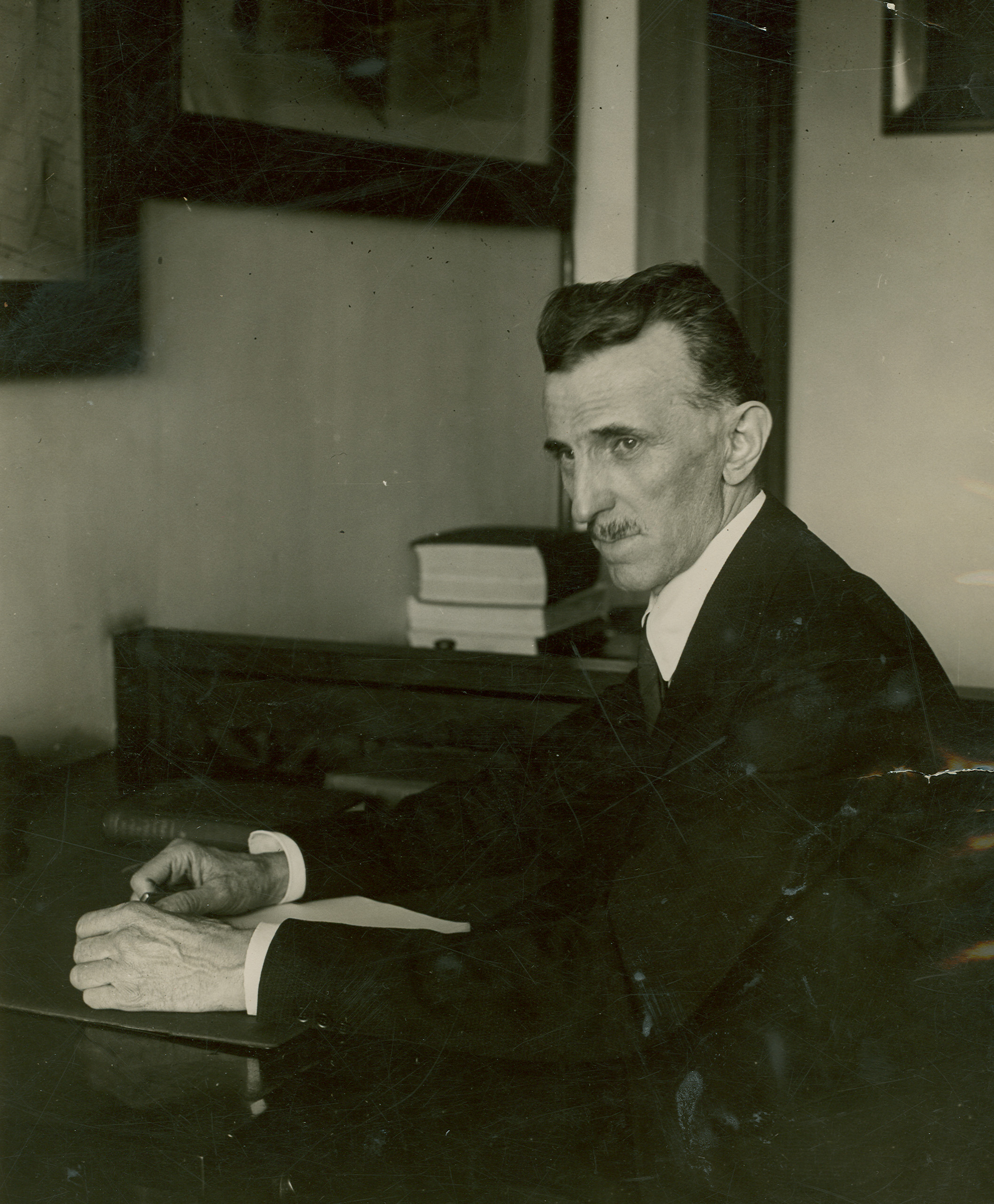 Tesla in his New York laboratory, third frame.
