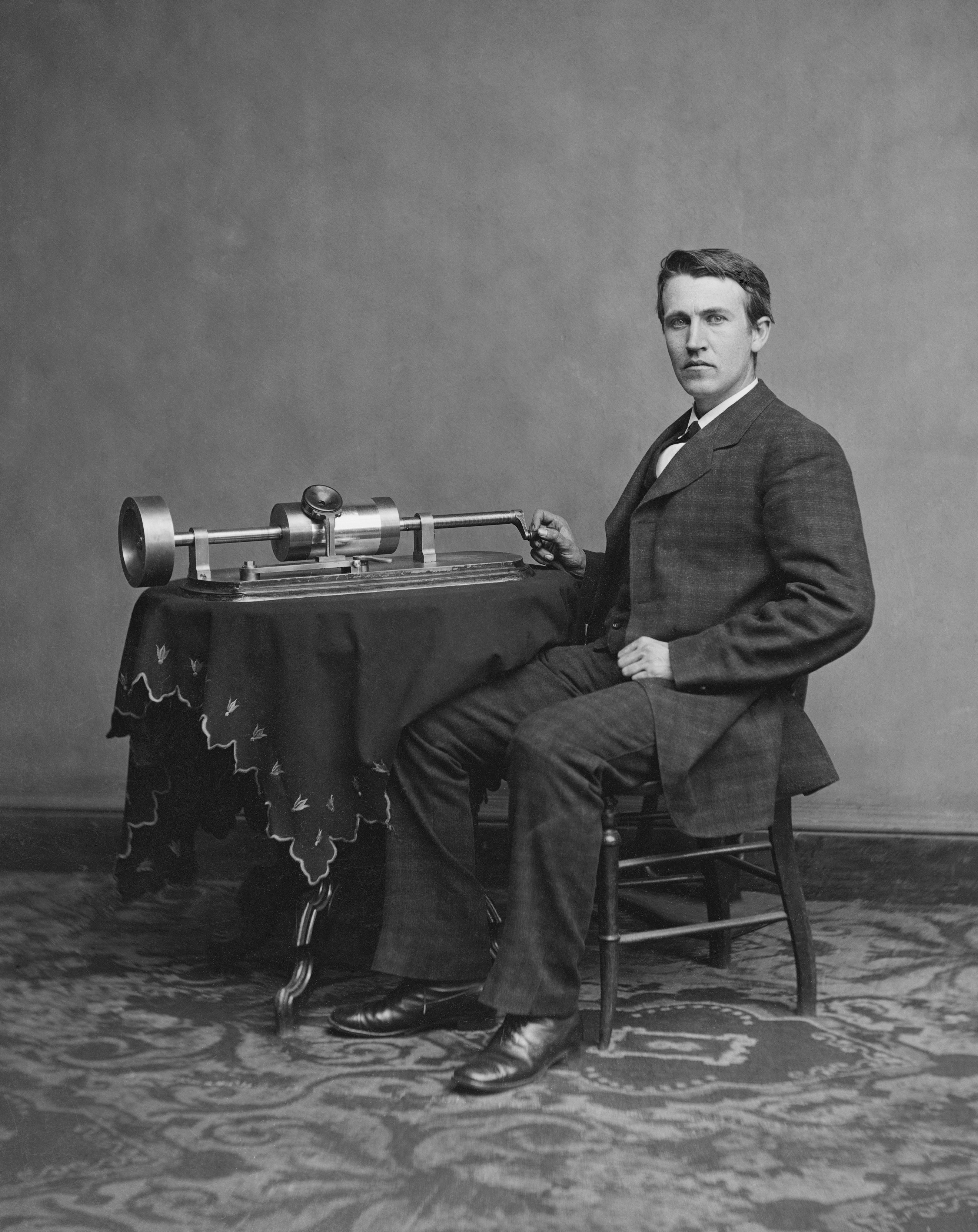 Thomas Edison with an early phonograph.