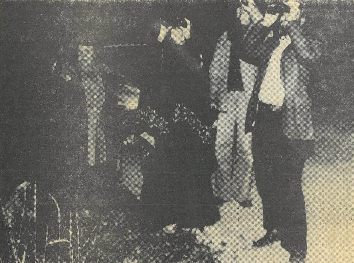 Betty Hill, left, and other UFO watchers scanning the night sky at her claimed landing site, an AP Wirephoto carried in the Laconia Evening Citizen, 10 October 1977.