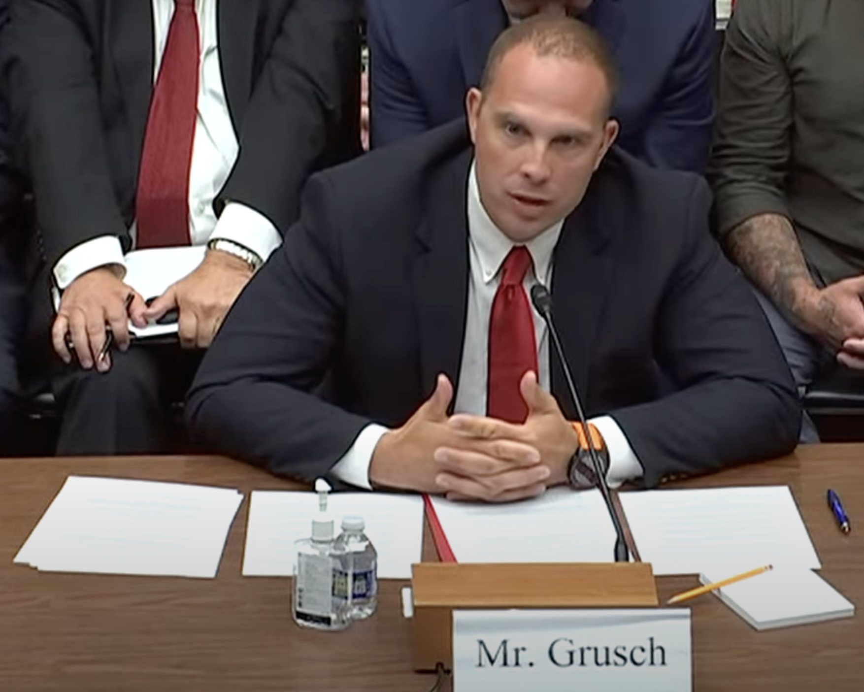 A witness testifying under oath before a United States congressional subcommittee on unidentified anomalous phenomena.