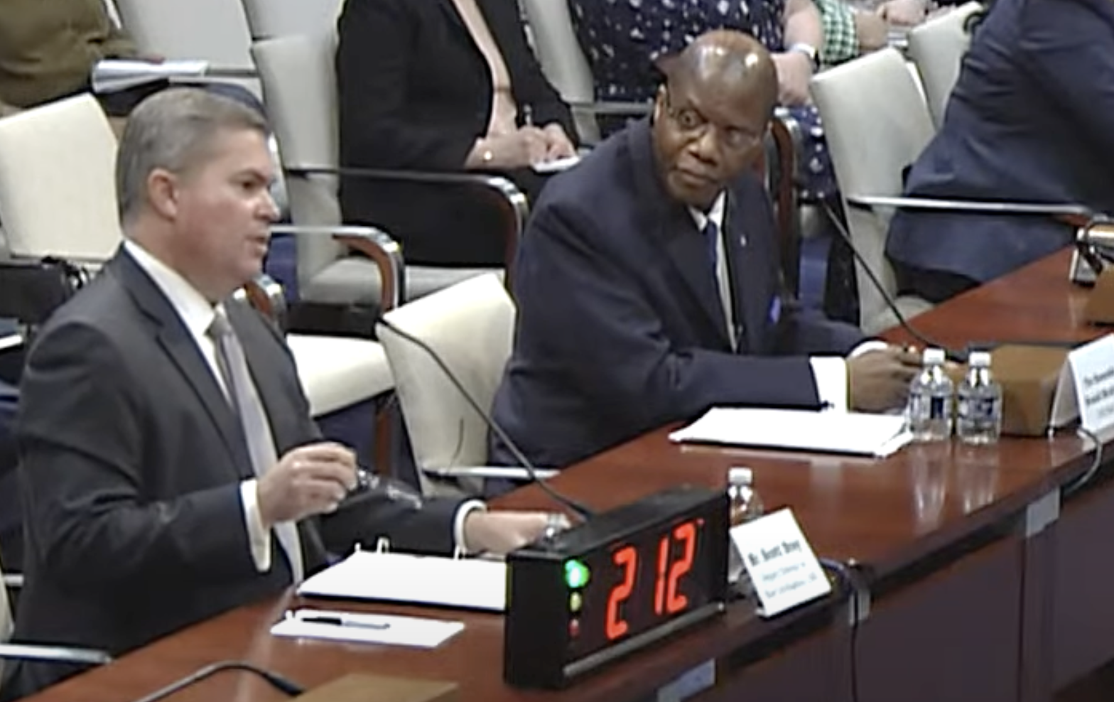 Ronald Moultrie and Scott Bray testifying before the House Intelligence Subcommittee, May 2022.