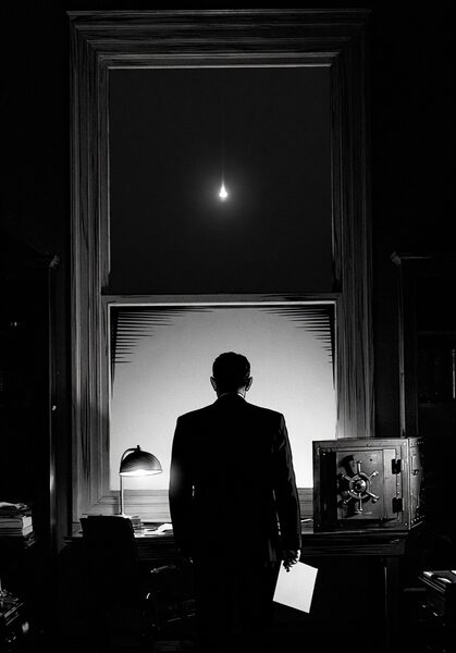 A silhouetted figure stands before a tall window gazing at a distant light in the night sky, a government safe visible beside the desk