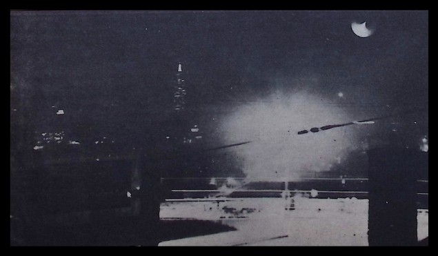 A grainy night photograph of a luminous object over the New York skyline, attributed to a U.S. Civil Defense sergeant in July 1952.