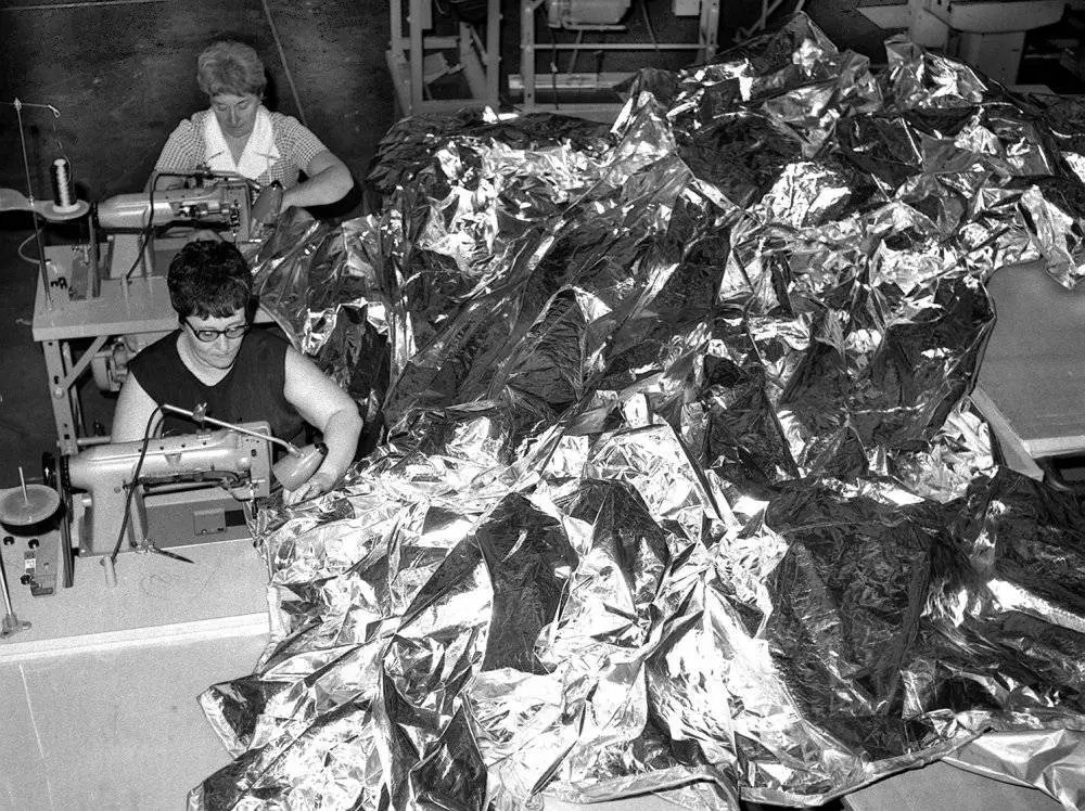 ILC Dover seamstresses hand-sewing Apollo spacesuits to tolerances of 1/64 inch.